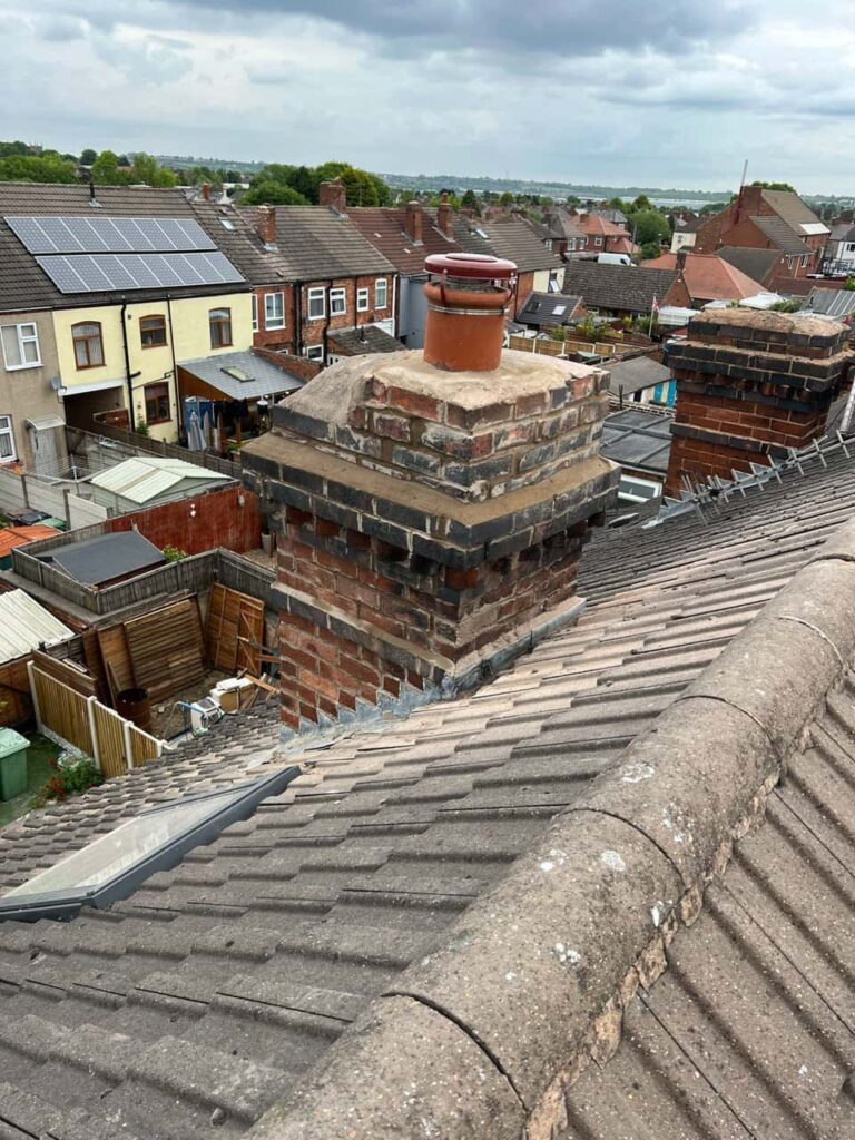 This is a photo taken from a roof which is being repaired by MCM Roofing Repairs Warminster, it shows a street of houses, and their roofs